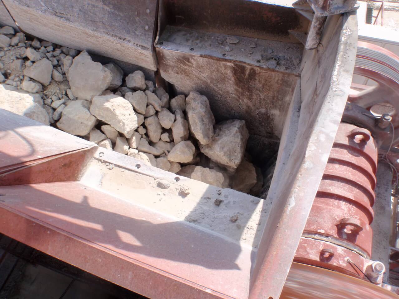 McLanahan employee working on a crusher